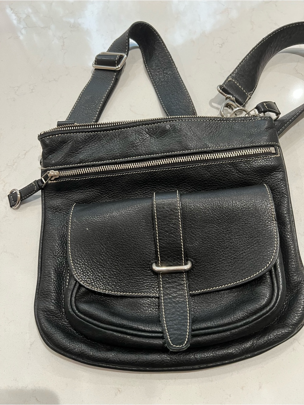 Roots Black Leather Crossbody Bag with Front Pocket and Zip